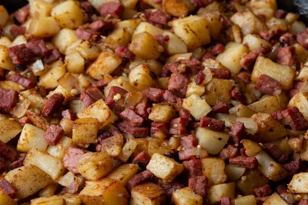 Side dish crafted with tender, golden fluffy and crispy potatoes marinated in a vibrant blend of fresh garlic, aromatic parsley, and rich olive oil. Seasoned to perfection with sea salt and cracked black pepper.