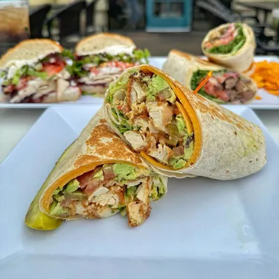 Flour tortilla, chipotle sauce, charbroiled chicken breast, provolone cheese, red onions, avocado, spring mix.